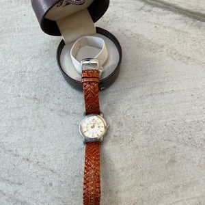 Brown braided band with silver face